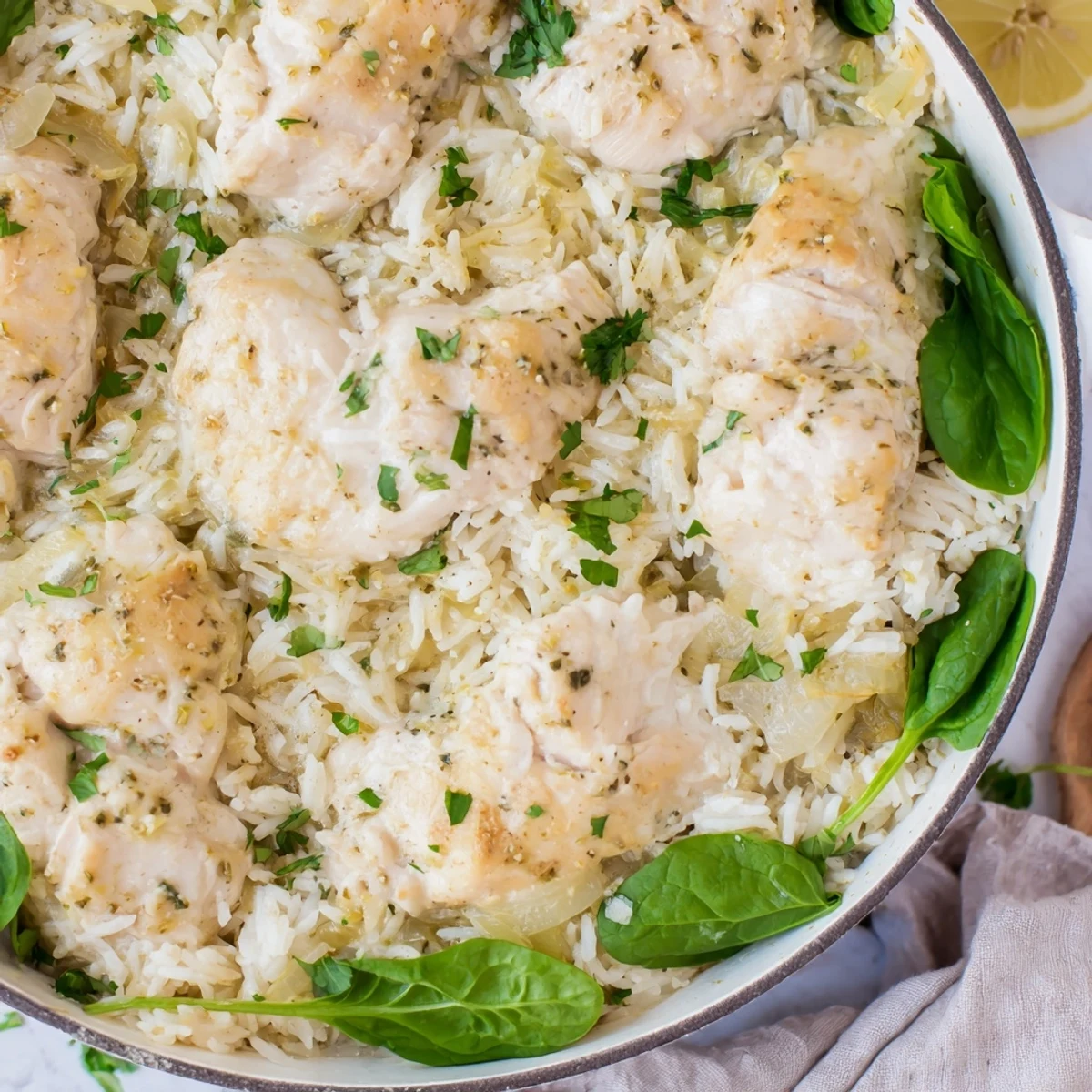 Creamy one pot angel chicken bake featuring golden brown chicken over rich Italian seasoned rice